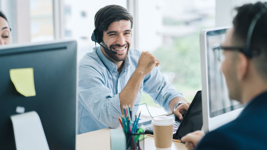 young-marketing-professional-headset-smiling