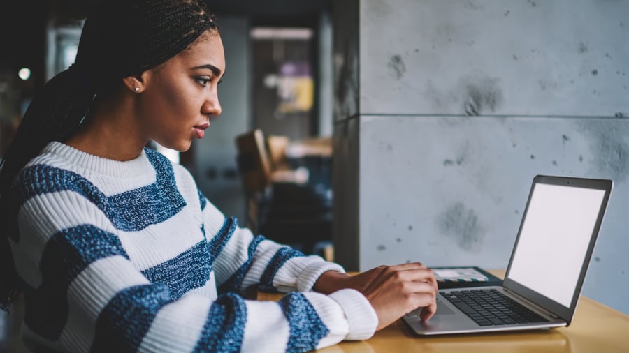 young-black-woman-computer-typing